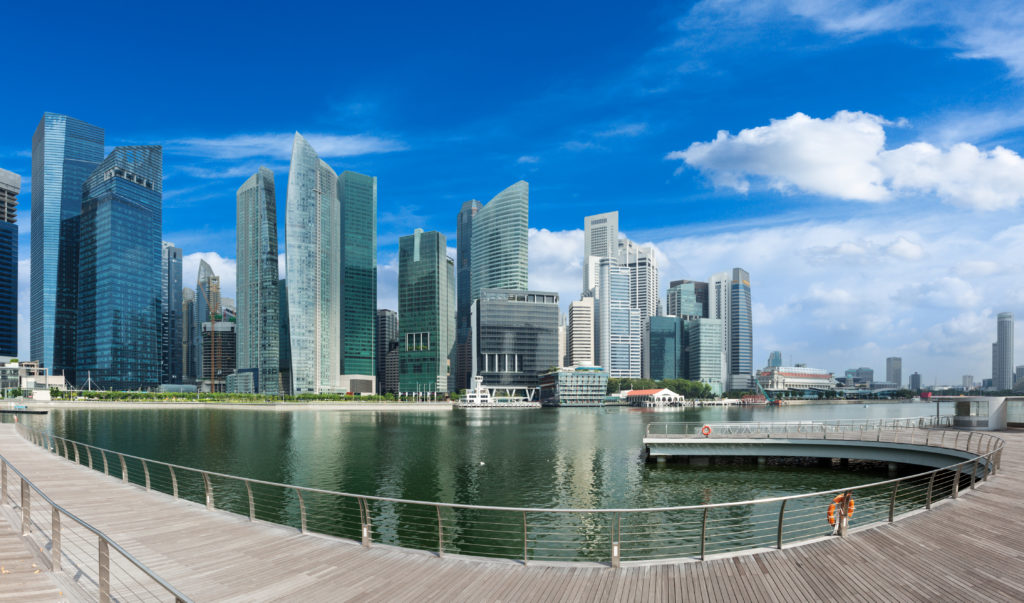 Singapore skyline of business district and Marina Bay panorama. Ultra wide angle
